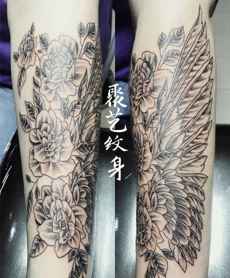 小臂素花翅膀纹身图片_手臂纹身图案