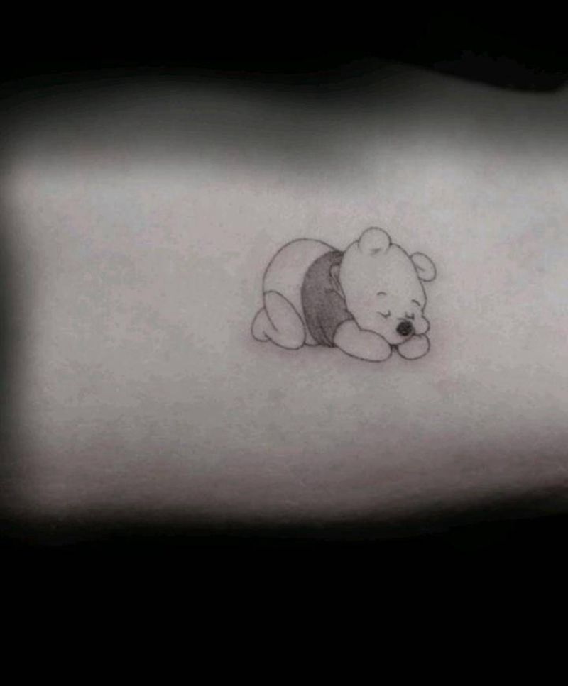 维尼纹身图片_手臂臀部几何纹身图案