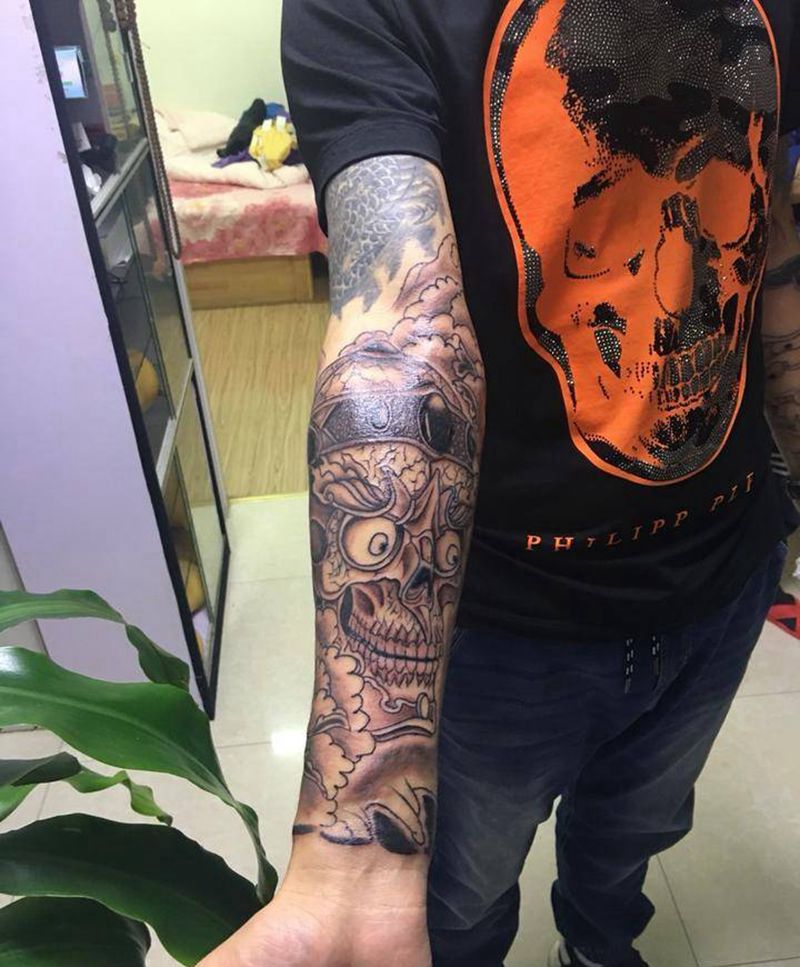 嘎巴拉接花臂纹身图片_