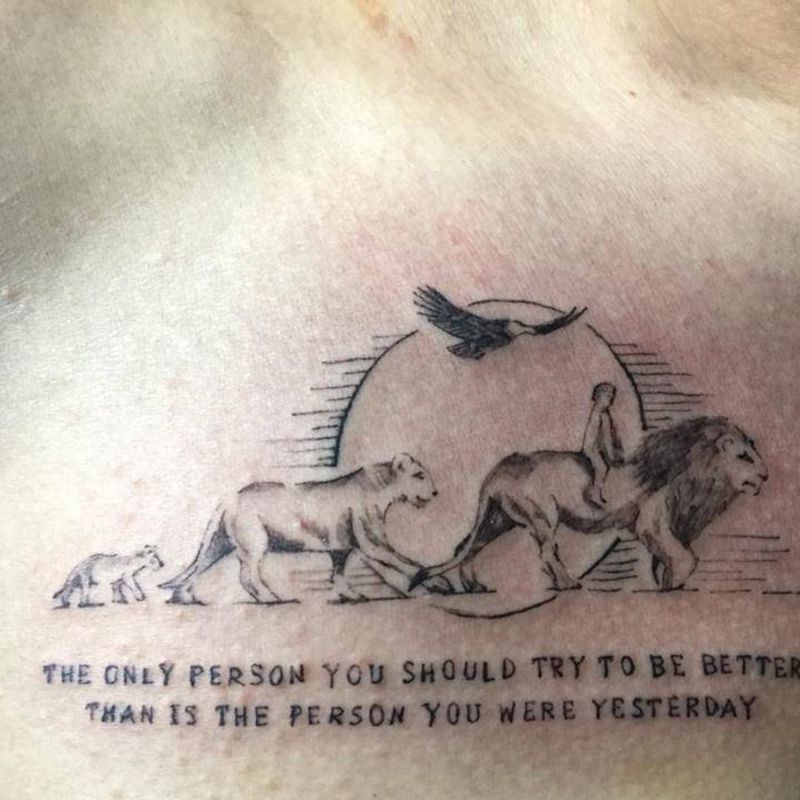 狮子一家纹身图片_清新动物胸部纹身图案