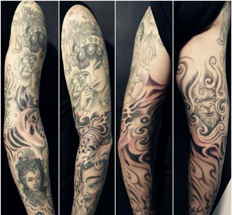 佛头花臂纹身图片_手臂传统肖像人物鬼神宗教成品纹身图案