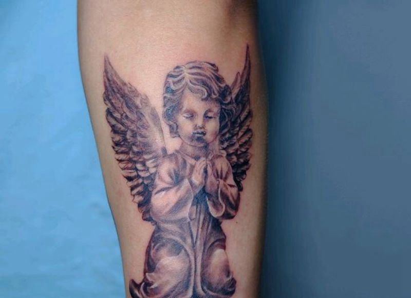 小天使纹身图片_手臂欧美写实纹身图案