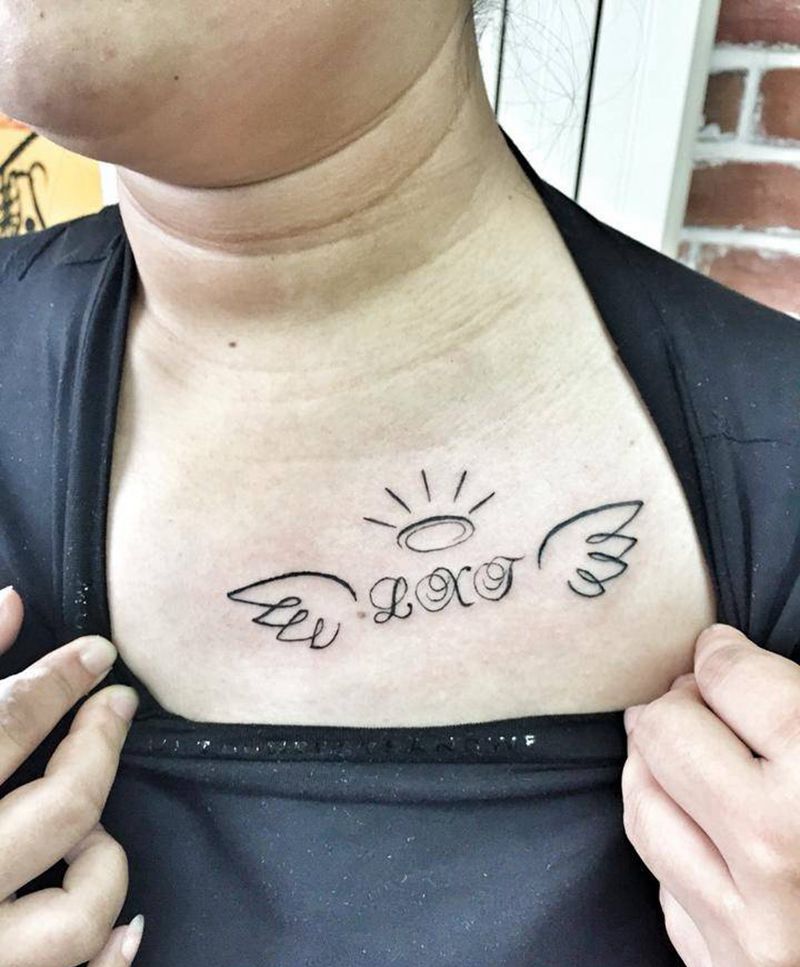 小翅膀字母纹身图片_清新字符胸部纹身图案