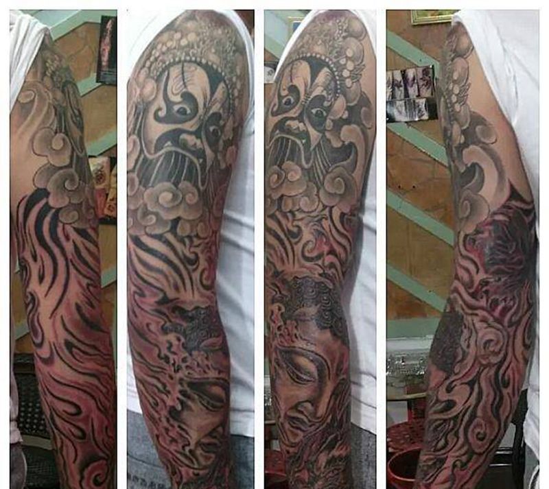 佛头花臂纹身图片_手臂传统人物宗教成品纹身图案