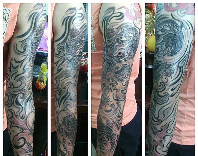 嘎巴拉鲤鱼花臂纹身图片_手臂传统动物人物宗教成品纹身图案