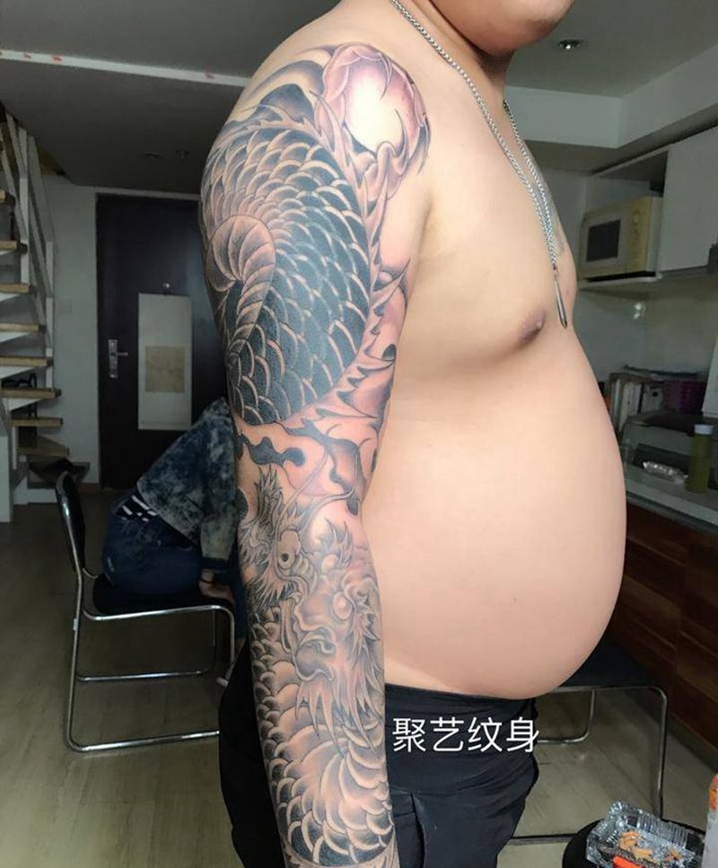 覆盖纹身盘臂龙纹身图片_