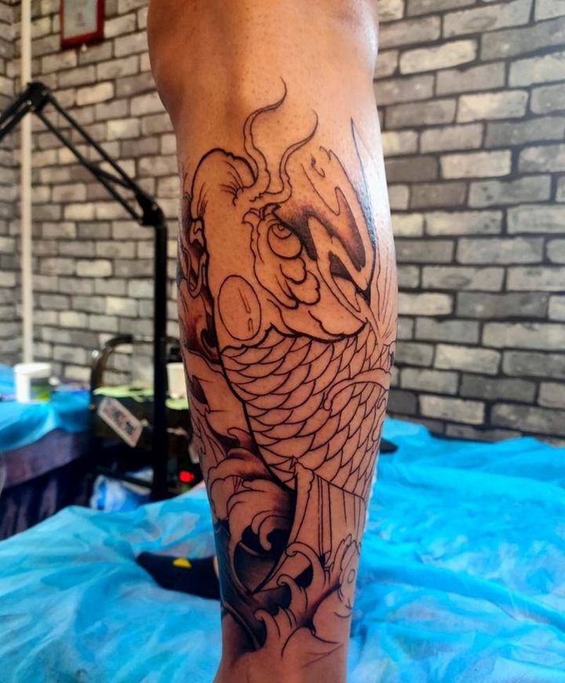 小腿鱼纹身图片_腿部纹身图案