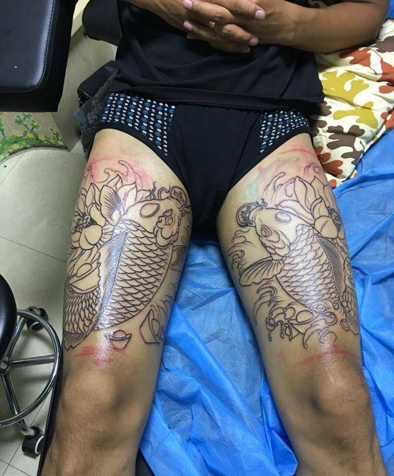 大腿鲤鱼割线纹身图片_