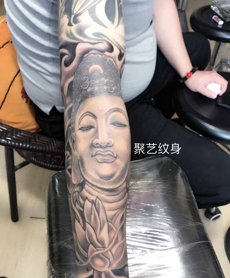接花臂佛头纹身图片_