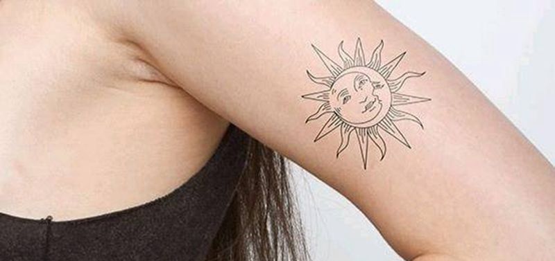 太阳纹身图片_手臂几何纹身图案