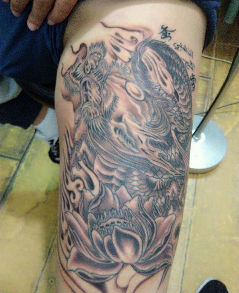 莲花云龙纹身图片_腿部传统动物宗教成品纹身图案