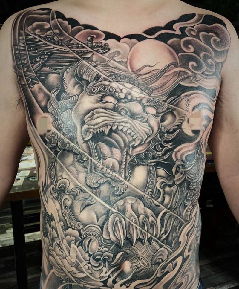 中华魂纹身图片_背部新传统唐狮牡丹纹身图案