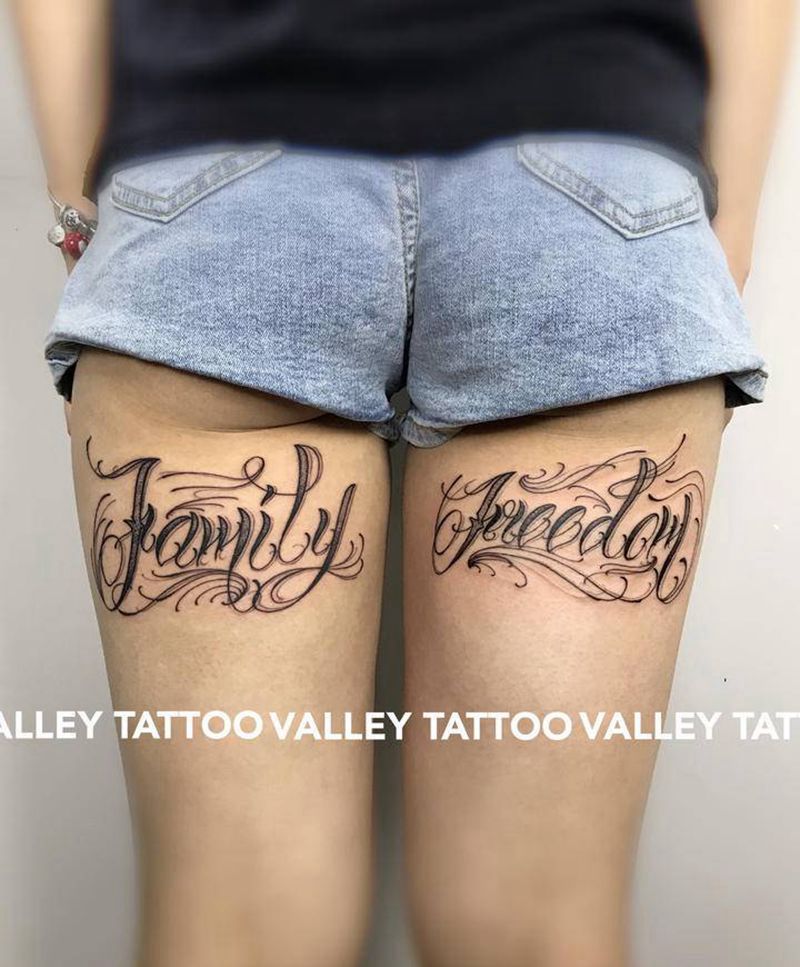 花体字纹身图片_腿部纹身图案