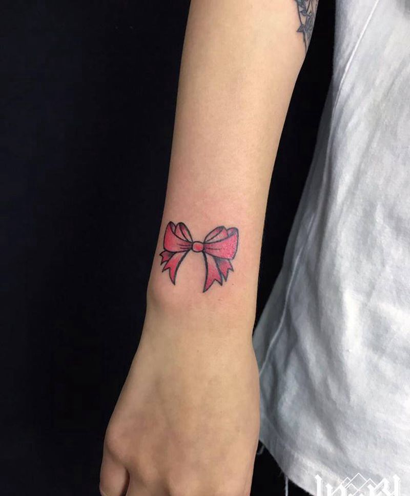 蝴蝶结纹身图片_手臂纹身图案