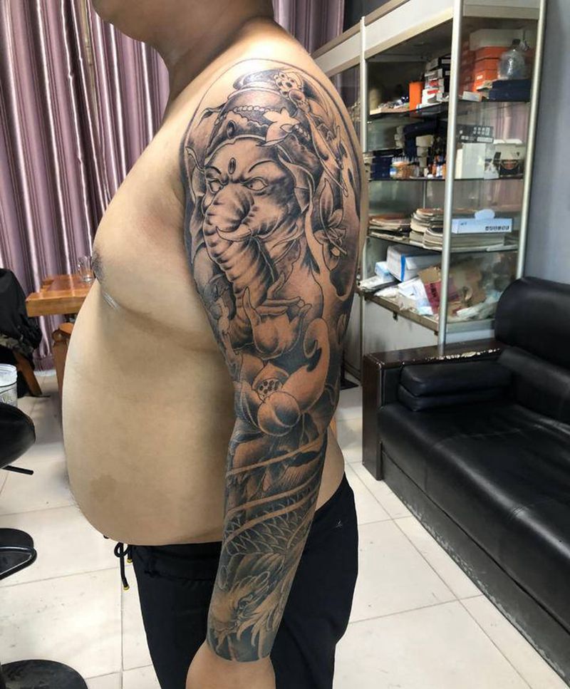 花臂大象鱼纹身图片_手臂纹身图案