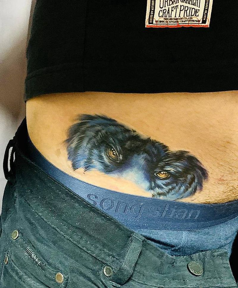 虎眼遮盖纹身图片_腹部欧美写实纹身图案