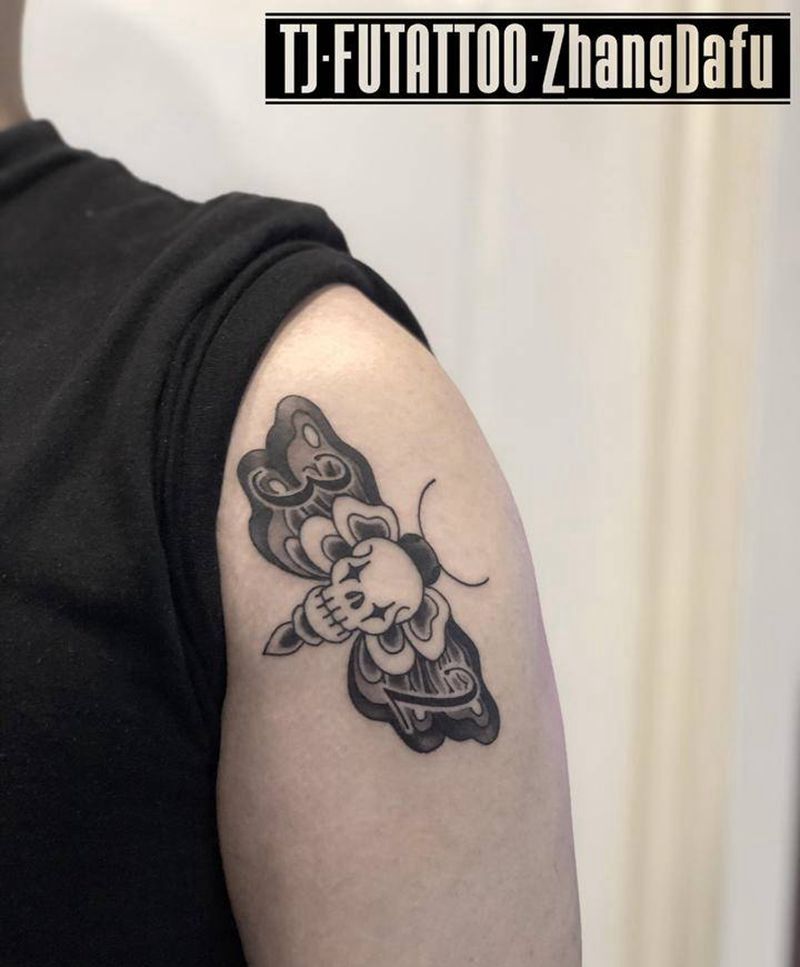 蝴蝶纹身图片_手臂Old School蝴蝶数字拼花臂纹身图案