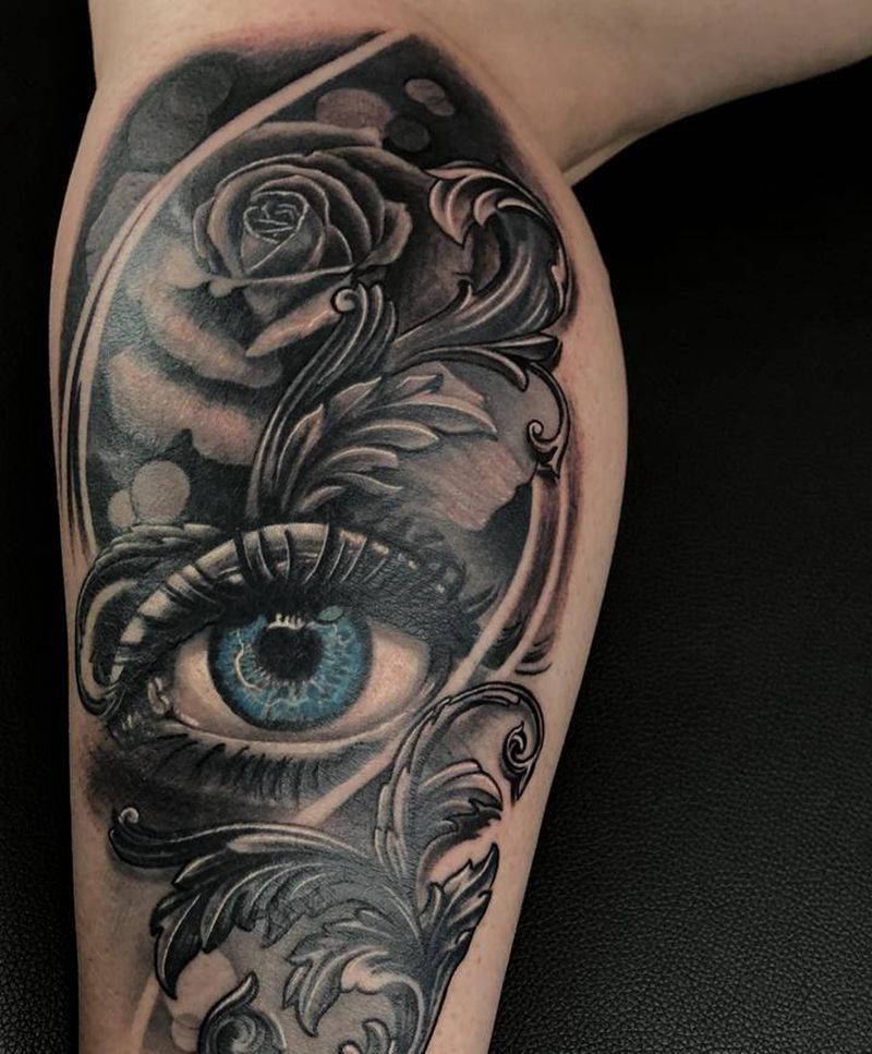玫瑰眼纹身图片_腿部纹身图案