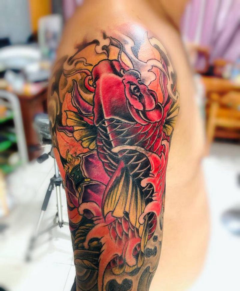 遮盖鲤鱼纹身图片_手臂纹身图案