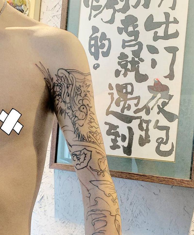 鲤鱼跃龙门~未完成纹身图片_手臂老传统纹身图案