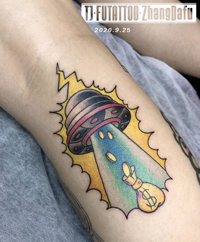 飞碟纹身图片_腿部Old School外星飞碟金币纹身图案