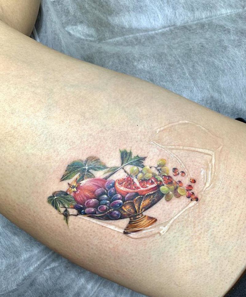 果盘纹身图片_腿部欧美写实纹身图案