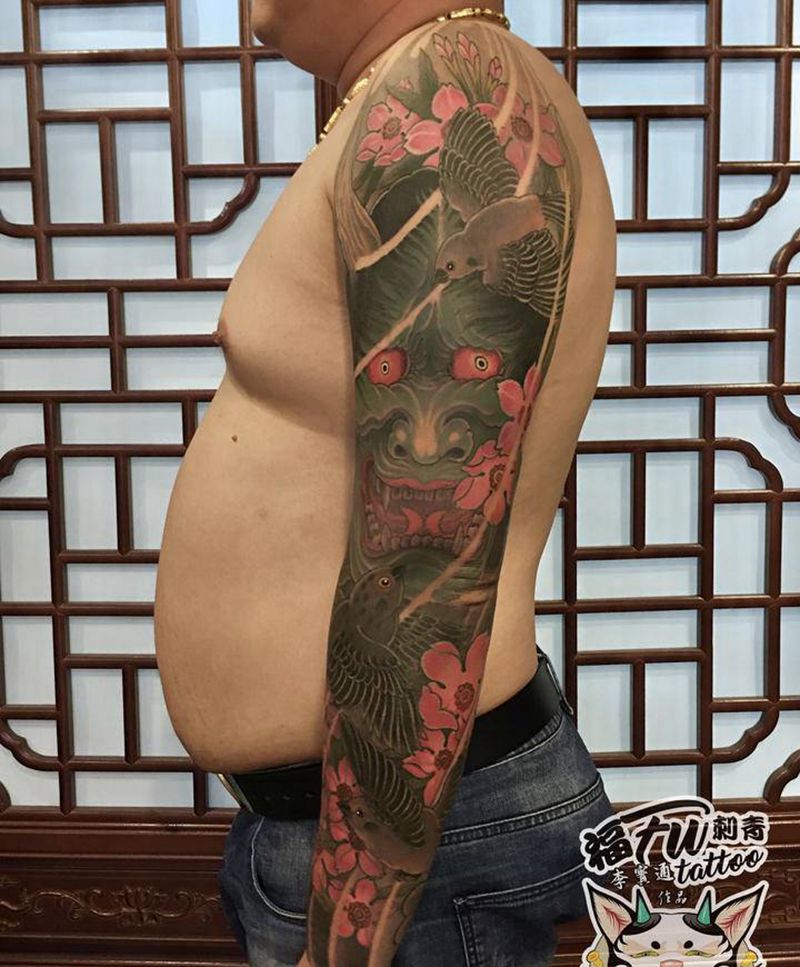 般若花臂纹身图片_手臂新传统纹身图案