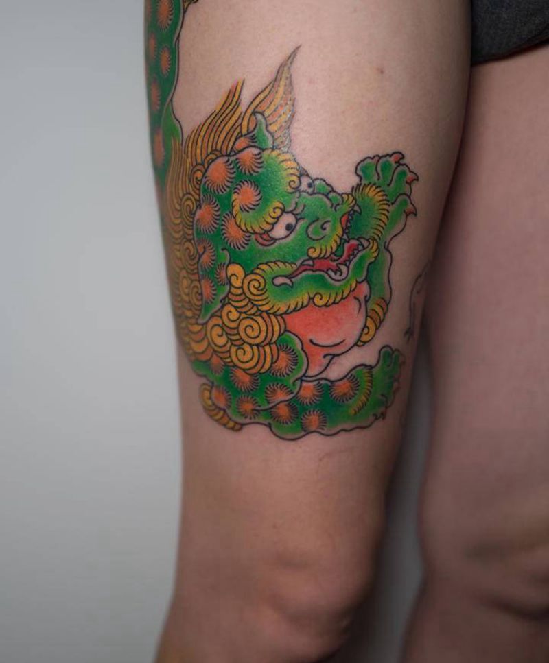 唐狮子纹身图片_腿部老传统纹身图案