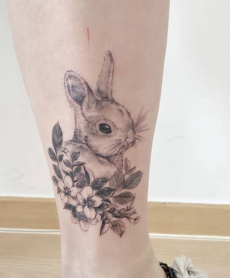 小兔纹身图片_腿部点刺兔子花清新纹身图案