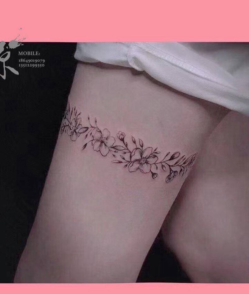 简约花卉纹身图片_腿部纹身图案