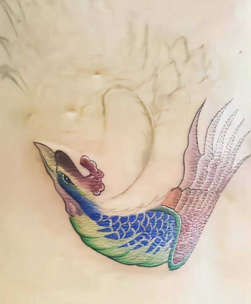 半背凤凰，未完工纹身图片_背部新传统纹身图案