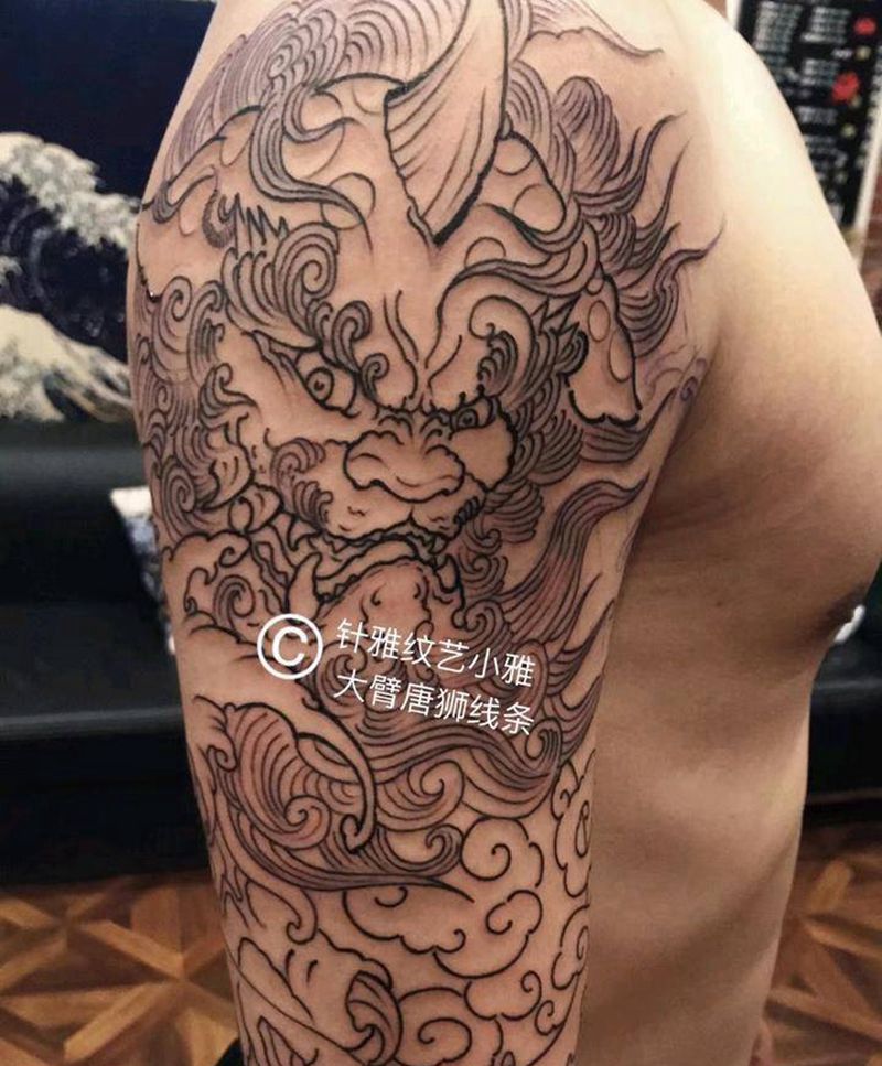 大臂唐狮粗步线条完成。纹身图片_