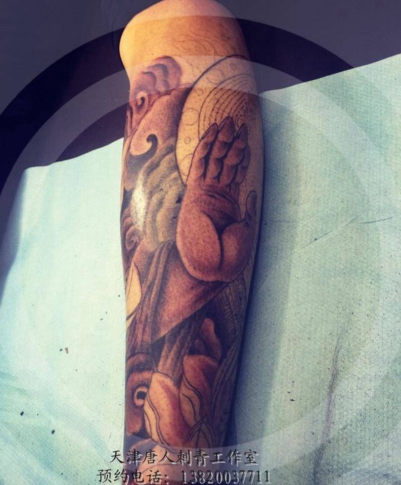 大日如来包小腿。未完待续纹身图片_