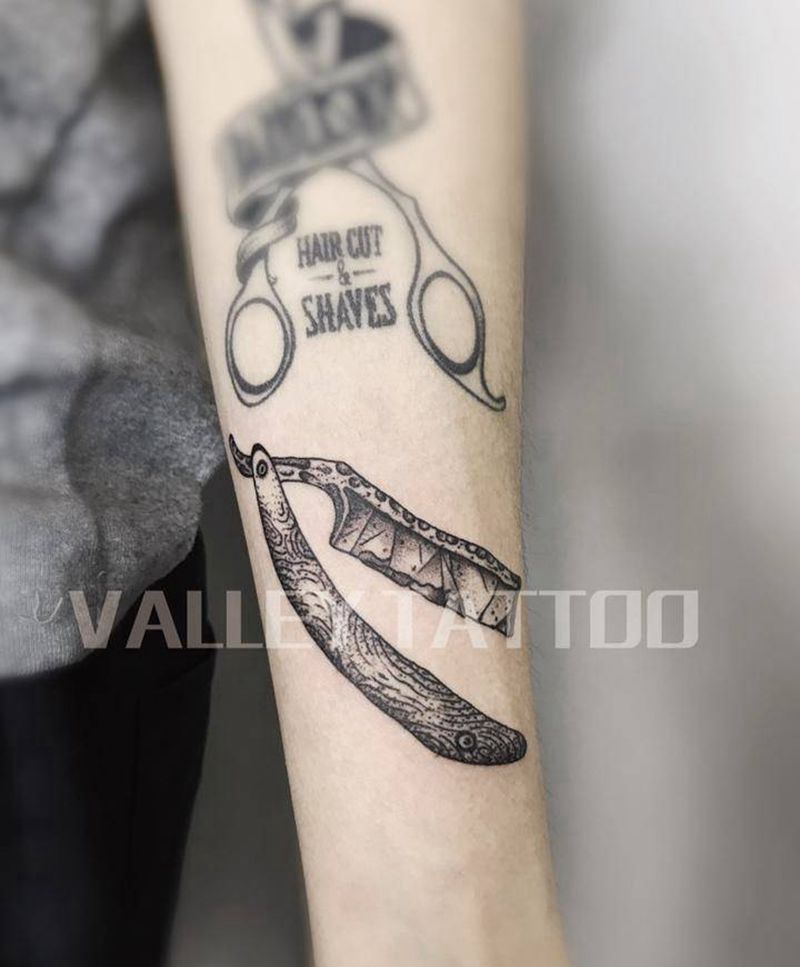 剃刀纹身图片_手臂点刺纹身图案