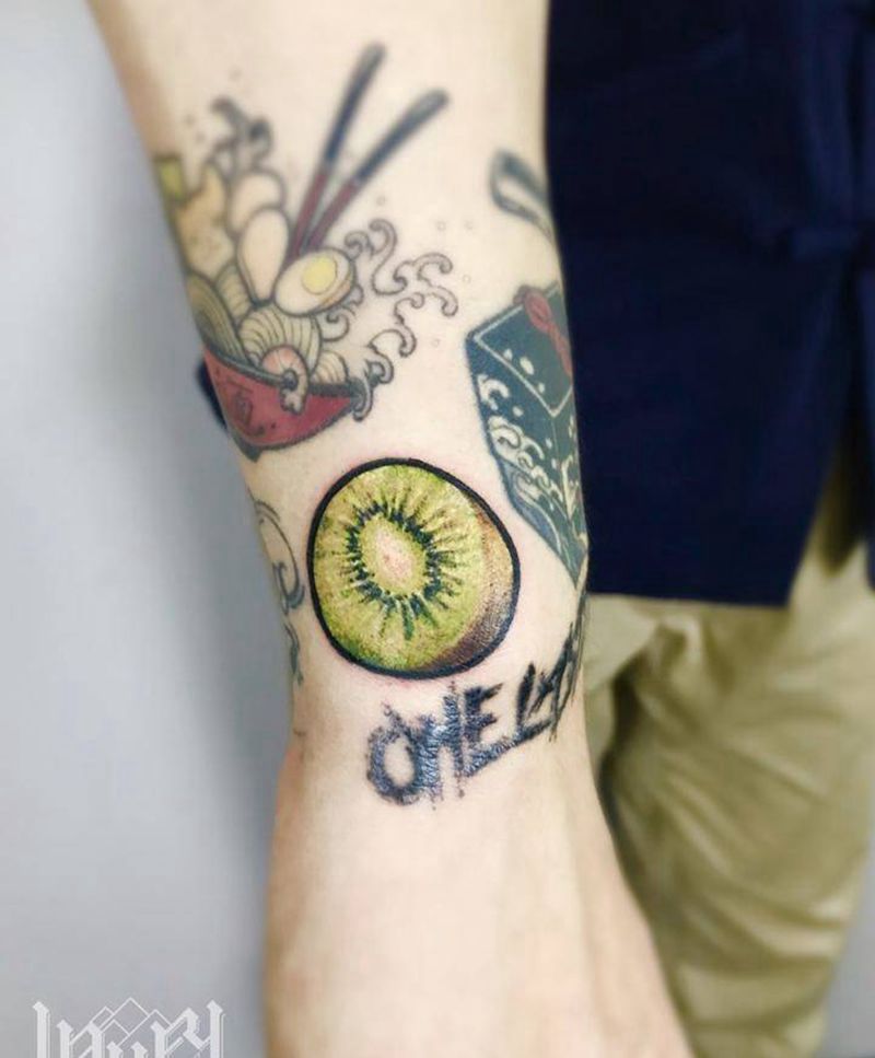 猕猴桃纹身图片_手臂欧美写实纹身图案