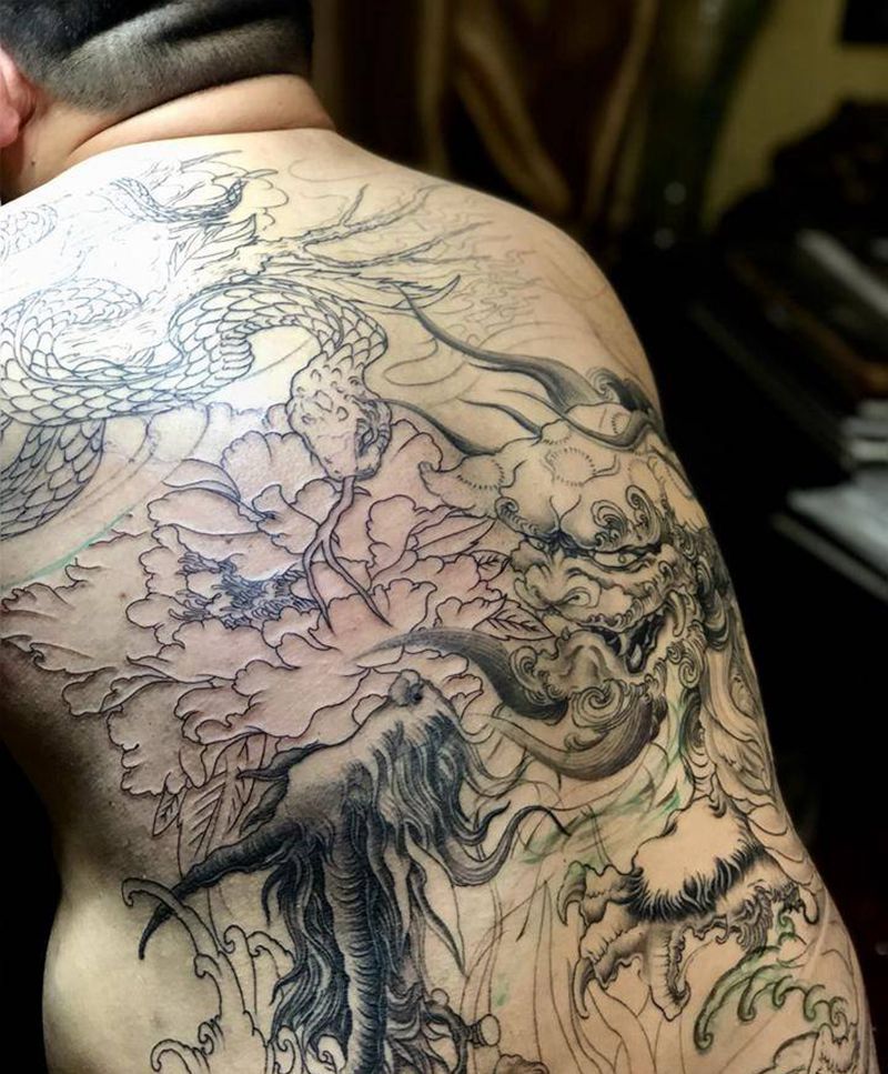 糖狮子  白泽 蟒纹身图片_