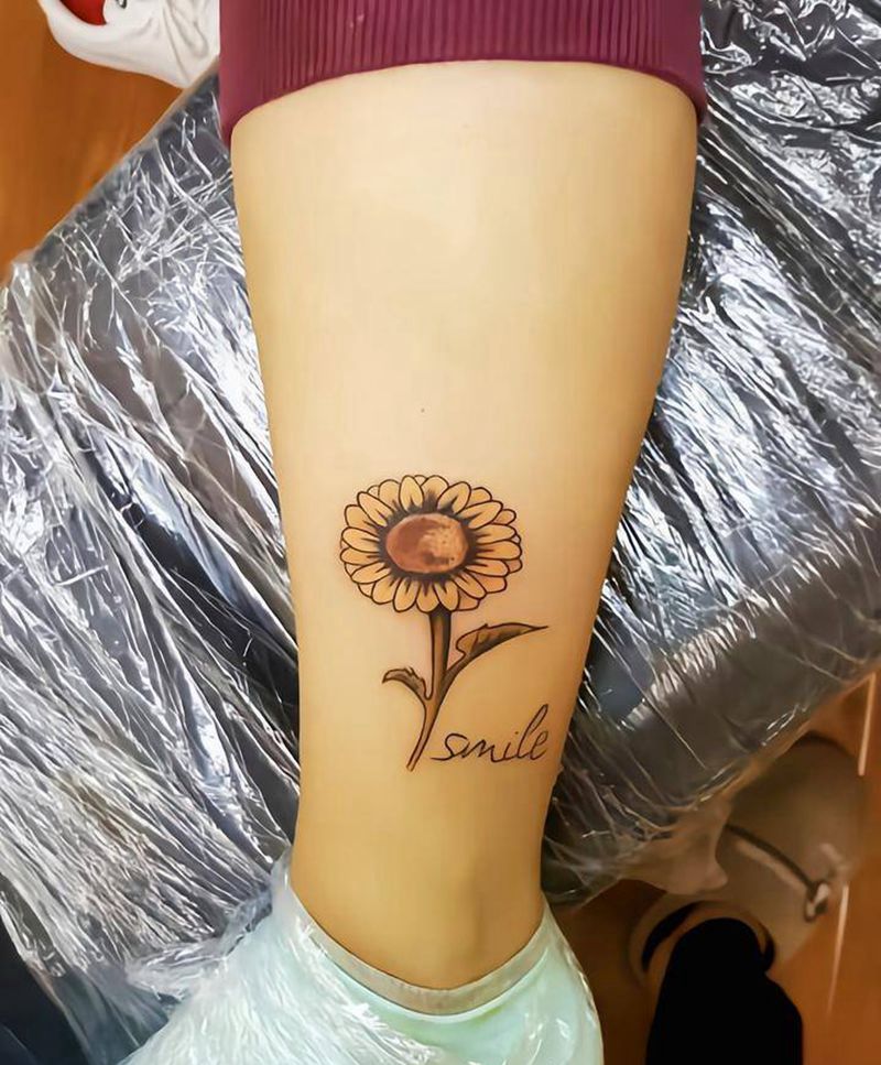 脚踝向日葵纹身图片_腿部欧美写实纹身图案