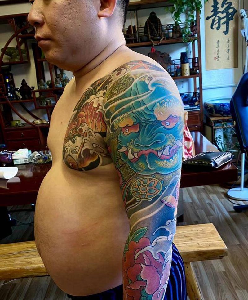 唐狮纹身图片_新传统纹身图案