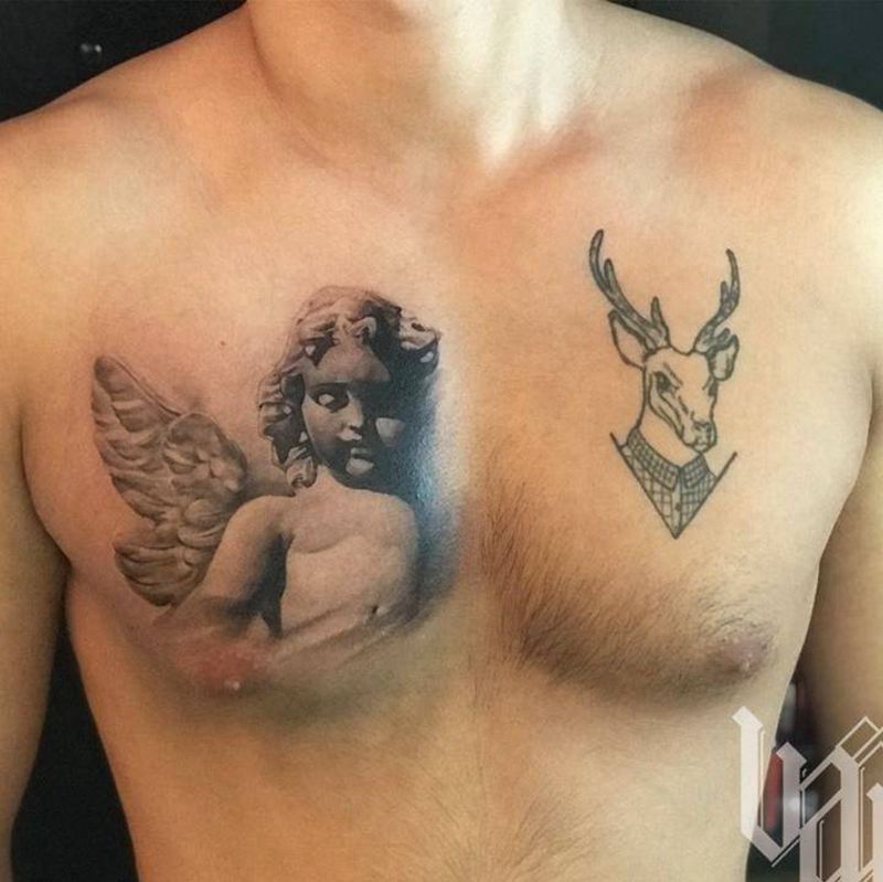 写实天使纹身图片_胸部欧美写实纹身图案