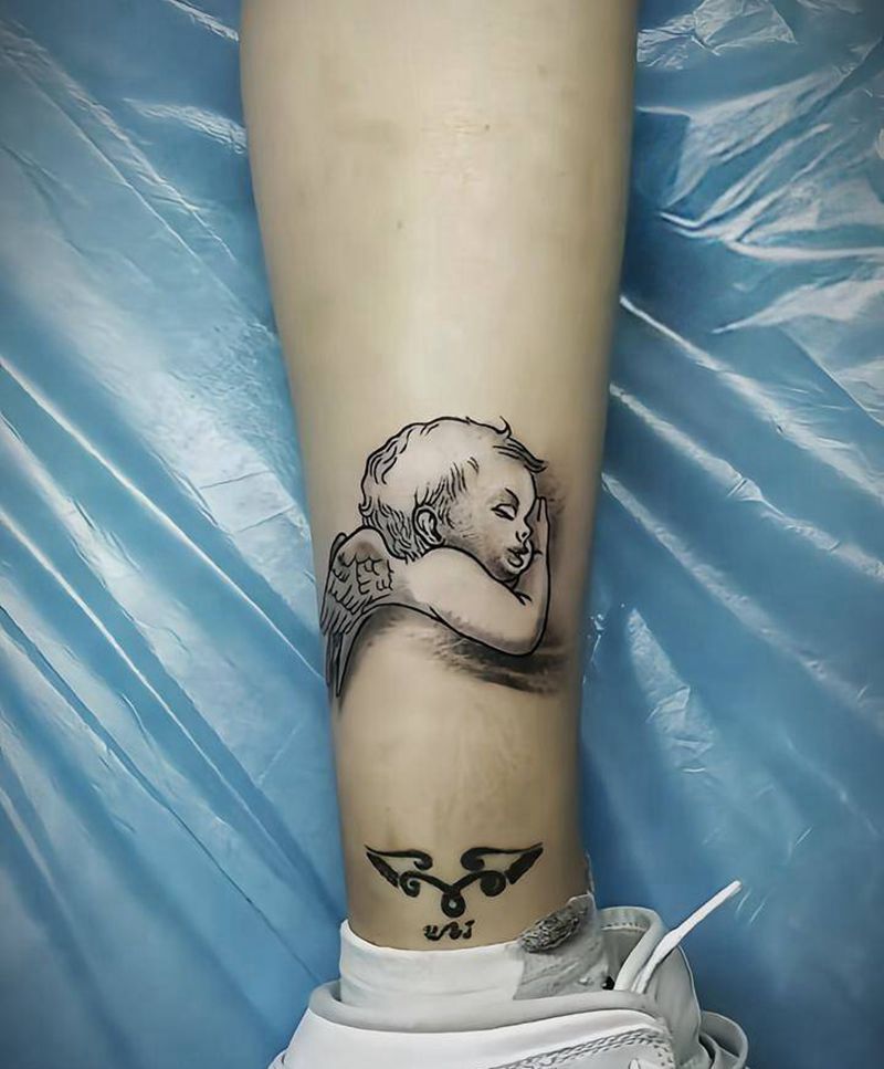 小天使纹身图片_腿部欧美写实纹身图案