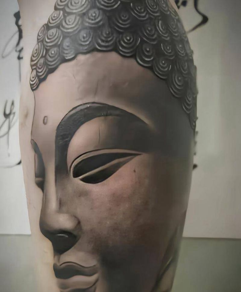 小腿佛像纹身图片_腿部新传统纹身图案