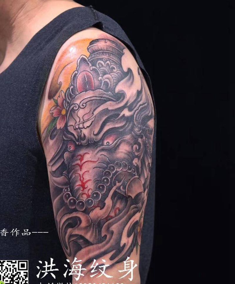 大臂象神纹身图片_手臂新传统纹身图案