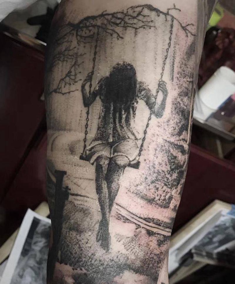 荡秋千纹身图片_