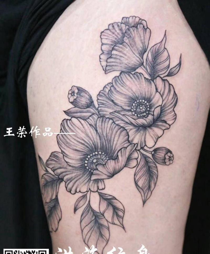 素花纹身图片_腿部点刺纹身图案