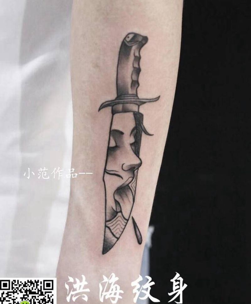 刀面上的女人纹身图片_手臂纹身图案