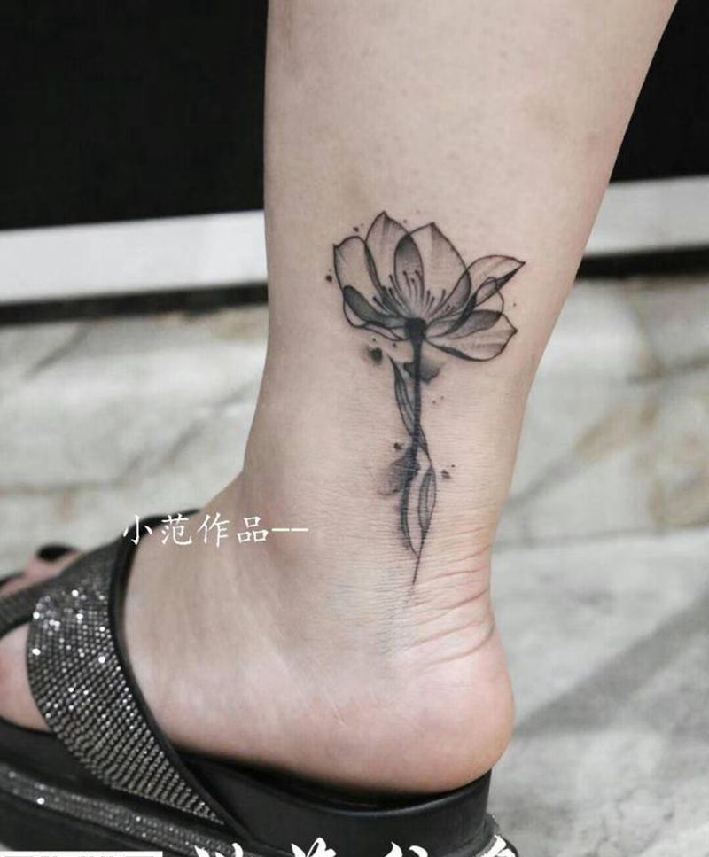 遮盖花朵纹身图片_腿部纹身图案