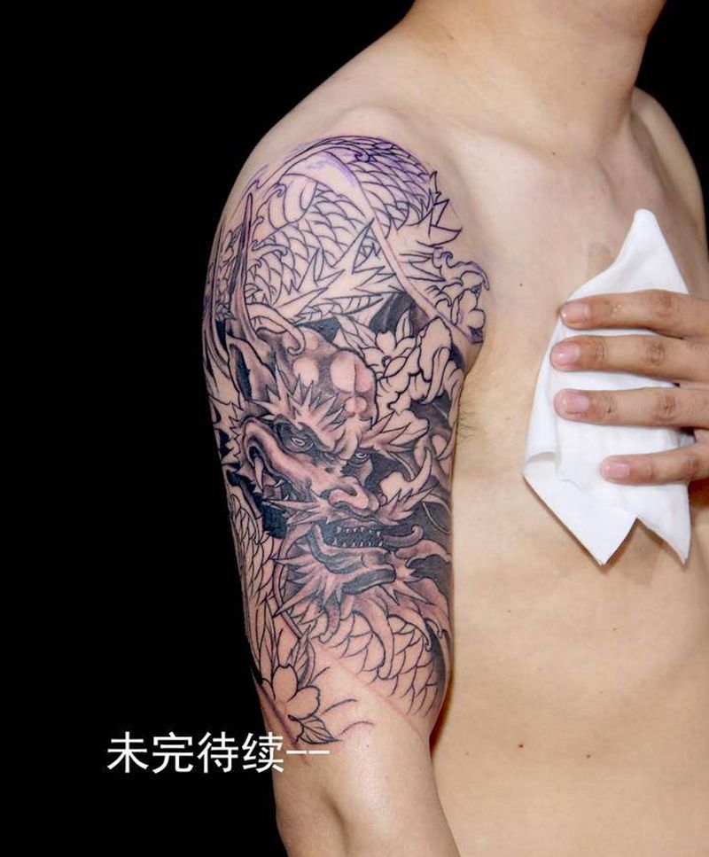 龙纹身图片_手臂新传统老传统纹身图案