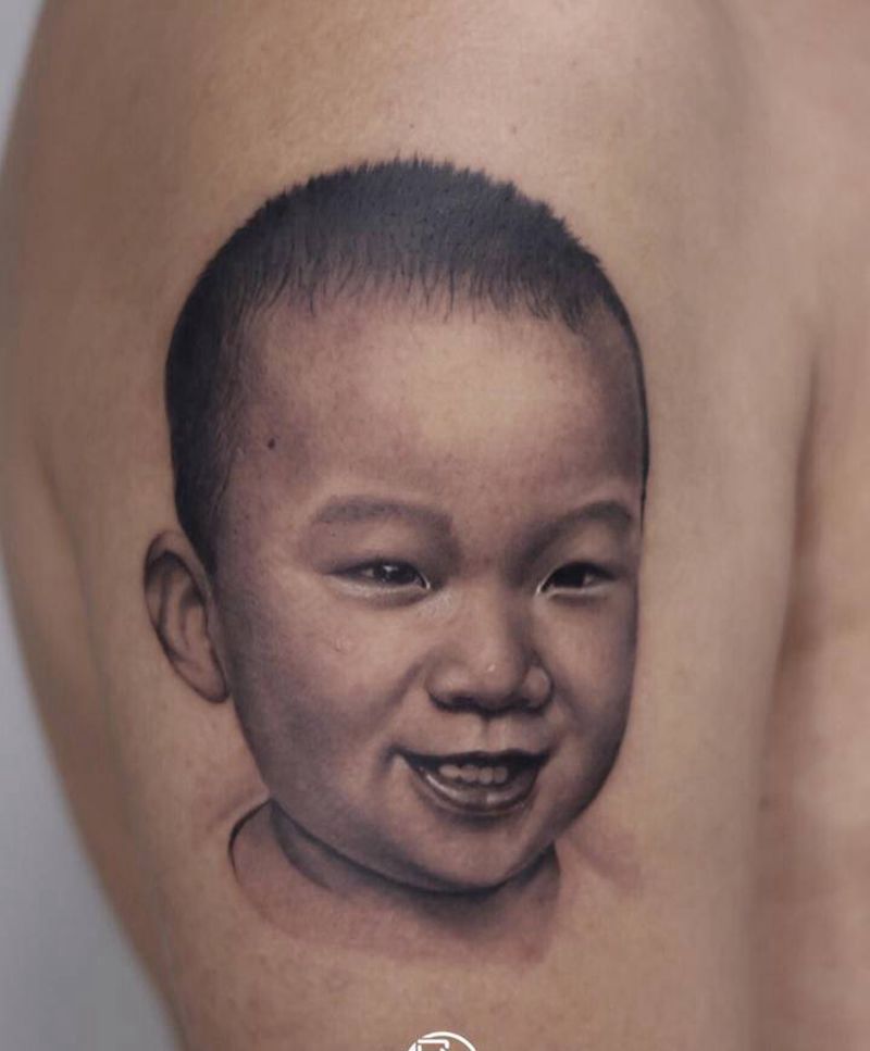 亲人肖像纹身图片_手臂欧美写实肖像亲人纹身图案