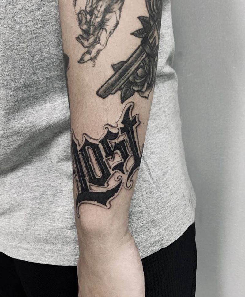 《Lost》纹身图片_手臂花体字纹身图案