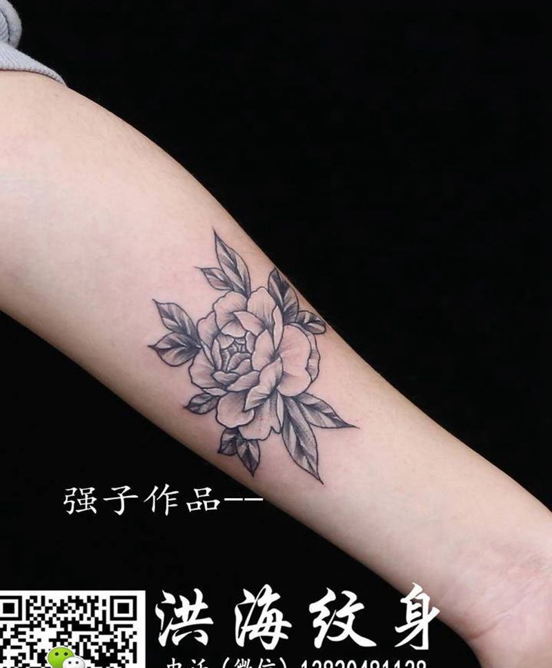 花纹身图片_手臂点刺纹身图案